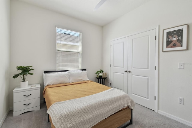 12517 Nantahala Run, Parrish, FL 34219 - carpeted bedroom featuring baseboards, a closet, and a ceiling fan