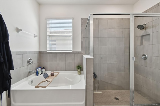 12517 Nantahala Run, Parrish, FL 34219 - bathroom featuring a garden tub and a shower stall