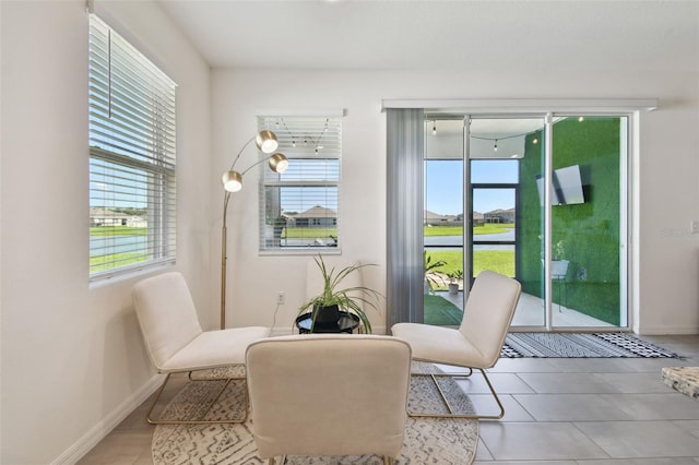 12517 Nantahala Run, Parrish, FL 34219 - sitting room with healthy amount of natural light, baseboards, and tile patterned floors
