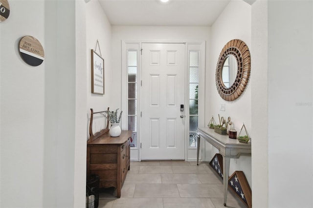 12517 Nantahala Run, Parrish, FL 34219 - entrance foyer featuring light tile patterned floors and healthy amount of natural light