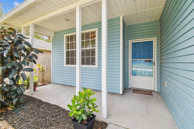 105 1st Ave SE, Lutz, FL 33549 - property entrance featuring a porch