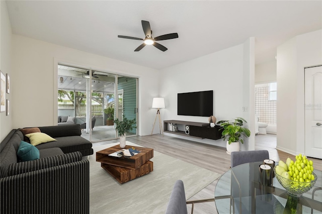 105 1st Ave SE, Lutz, FL 33549 - living room with ceiling fan and wood finished floors