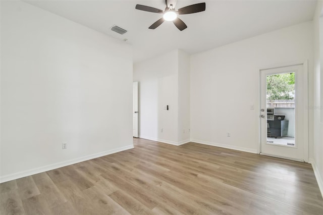 105 1st Ave SE, Lutz, FL 33549 - unfurnished room featuring ceiling fan, light wood-type flooring, and baseboards