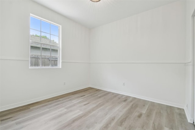 105 1st Ave SE, Lutz, FL 33549 - unfurnished room with light wood-style flooring and baseboards
