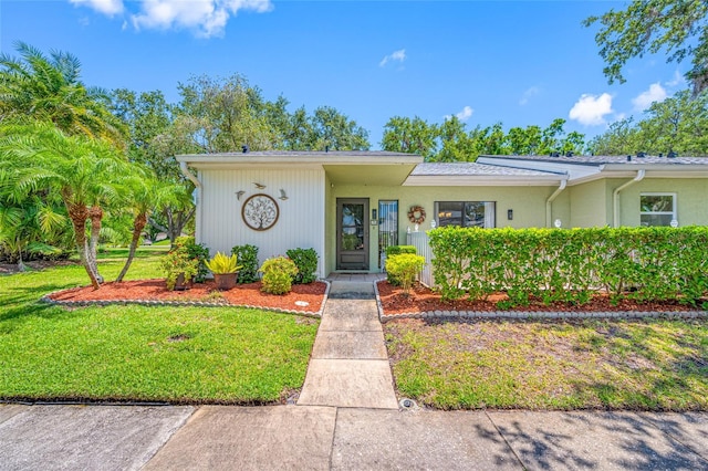 70 Cypress Pl, Oldsmar, FL 34677 - view of front of property with a front lawn