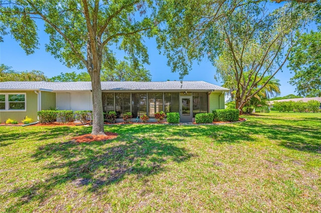 70 Cypress Pl, Oldsmar, FL 34677 - view of front of property featuring a sunroom and a front yard