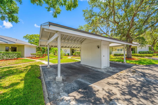70 Cypress Pl, Oldsmar, FL 34677 - view of parking / parking lot with a carport