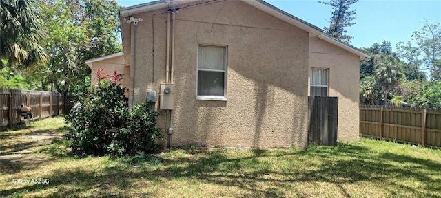 3680 19th Ave S, Saint Petersburg, FL 33711 - view of side of property featuring stucco siding