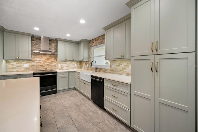1766 Hitching Post Ln, Dunedin, FL 34698 - kitchen featuring wall chimney exhaust hood, black appliances, tasteful backsplash, gray cabinets, and a sink