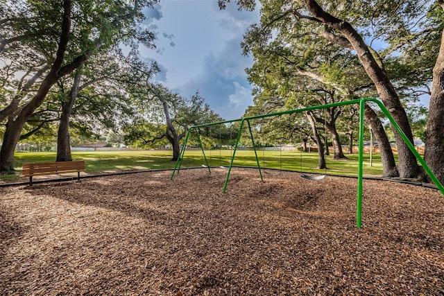 1766 Hitching Post Ln, Dunedin, FL 34698 - communal playground featuring a yard