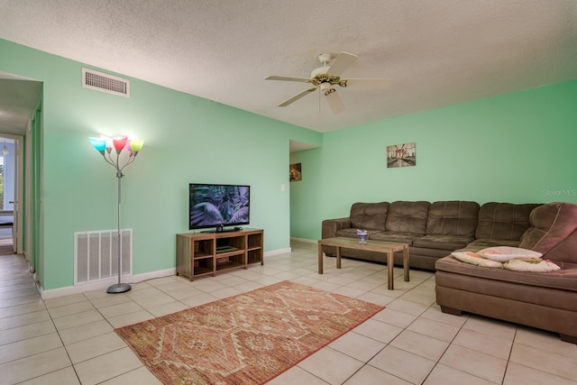 255 114th Ave N Unit 4, Saint Petersburg, FL 33716 - tiled living area with a ceiling fan and a textured ceiling
