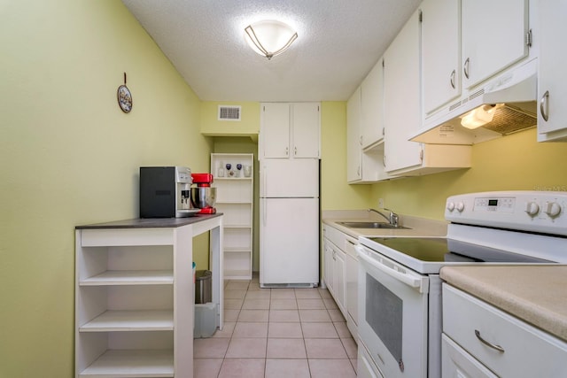 255 114th Ave N Unit 4, Saint Petersburg, FL 33716 - kitchen featuring white appliances, under cabinet range hood, open shelves, a textured ceiling, and a sink