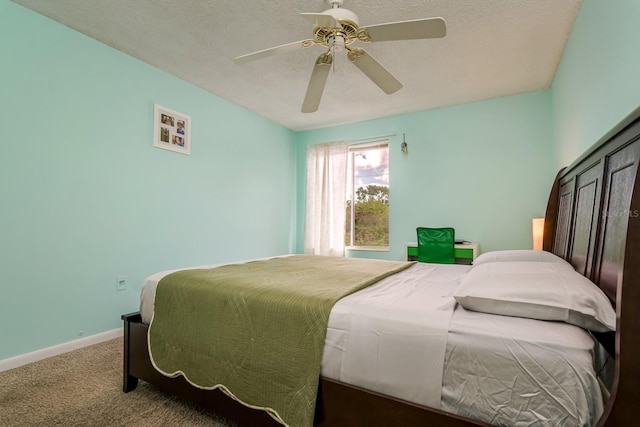 255 114th Ave N Unit 4, Saint Petersburg, FL 33716 - bedroom with carpet floors, baseboards, a ceiling fan, and a textured ceiling