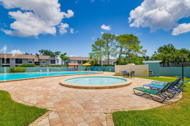 255 114th Ave N Unit 4, Saint Petersburg, FL 33716 - community pool with a patio