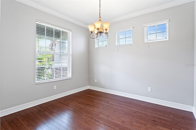 7725 Tangle Rush Dr, Gibsonton, FL 33534 - empty room featuring a chandelier, dark wood-style flooring, crown molding, and baseboards