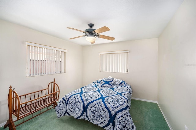 10400 112th Way, Largo, FL 33778 - bedroom featuring carpet flooring, baseboards, and a ceiling fan