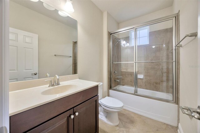 1229 Hillandale Reserve Dr, Tampa, FL 33613 - bathroom with vanity and bath / shower combo with glass door
