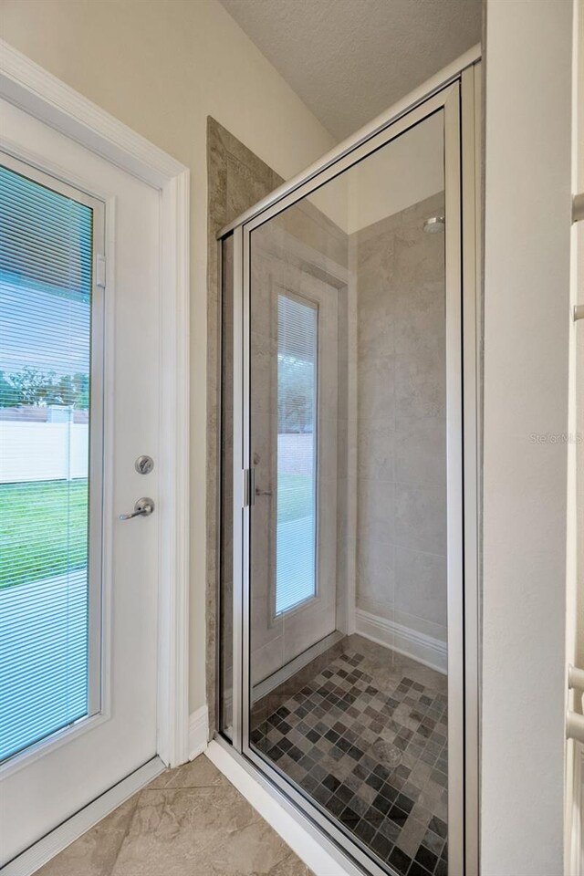 1229 Hillandale Reserve Dr, Tampa, FL 33613 - bathroom featuring a stall shower