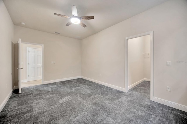 1229 Hillandale Reserve Dr, Tampa, FL 33613 - carpeted empty room with ceiling fan and a smoke detector