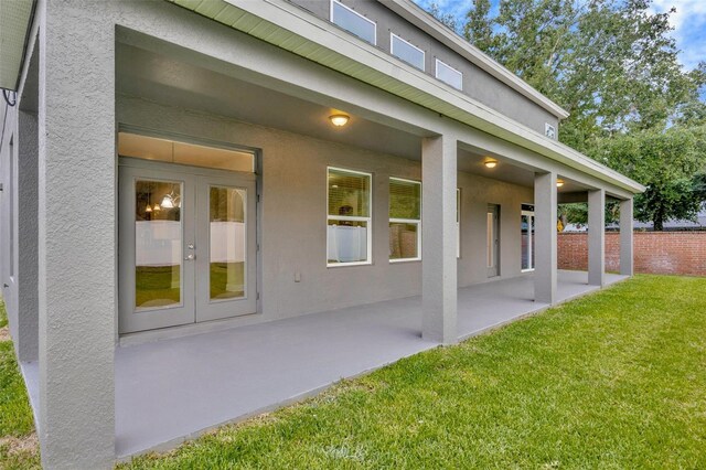 1229 Hillandale Reserve Dr, Tampa, FL 33613 - view of patio with french doors