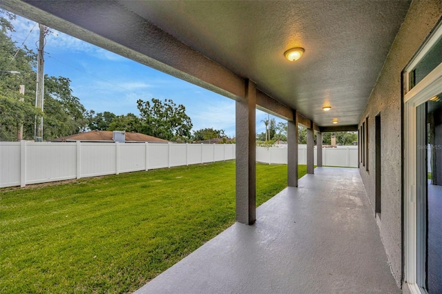 1229 Hillandale Reserve Dr, Tampa, FL 33613 - fenced backyard featuring a patio area