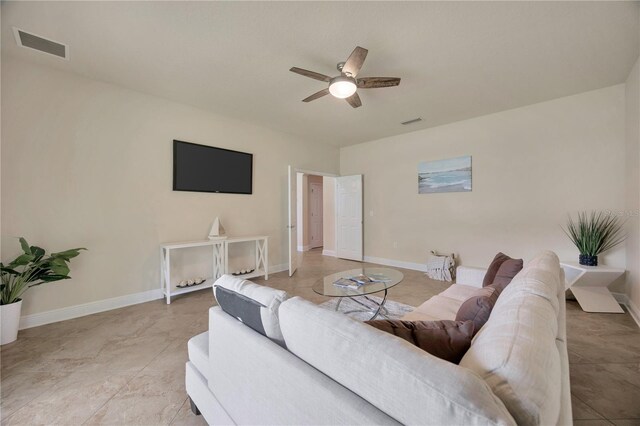 1229 Hillandale Reserve Dr, Tampa, FL 33613 - living room featuring ceiling fan and baseboards
