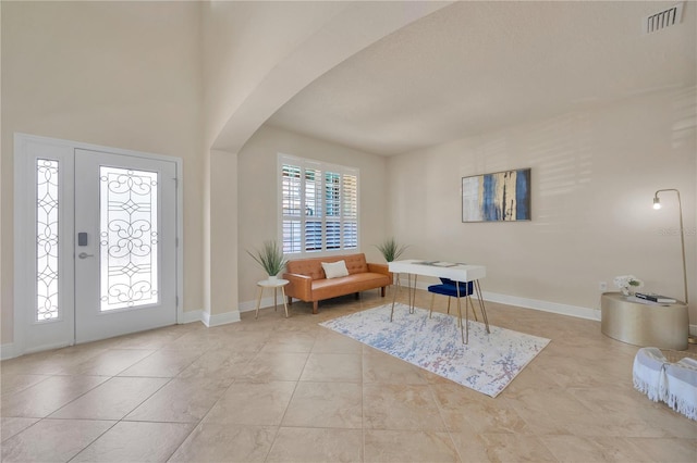 1229 Hillandale Reserve Dr, Tampa, FL 33613 - foyer entrance featuring arched walkways and baseboards