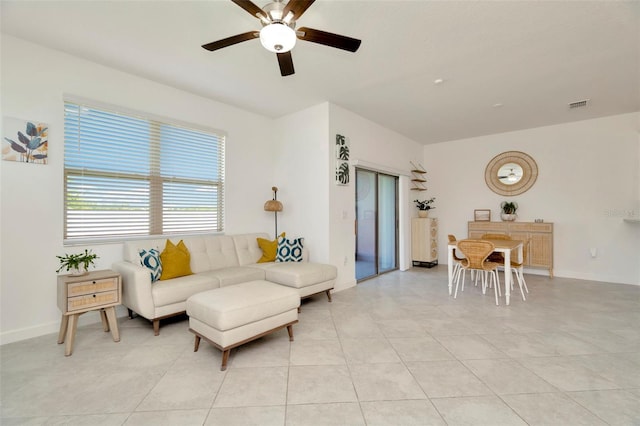 3228 Bryant Park Dr, New Port Richey, FL 34655 - living room featuring ceiling fan and light tile patterned flooring