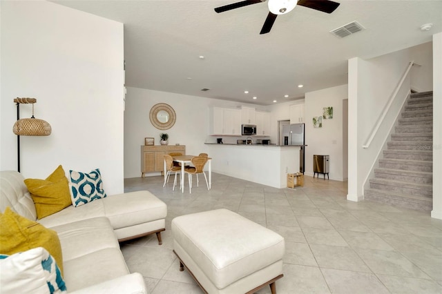 3228 Bryant Park Dr, New Port Richey, FL 34655 - living room with stairs, a ceiling fan, light tile patterned flooring, and recessed lighting