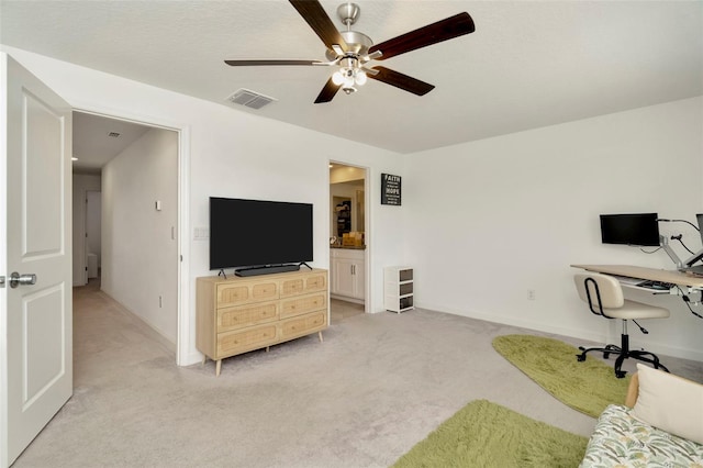3228 Bryant Park Dr, New Port Richey, FL 34655 - office with light colored carpet, ceiling fan, and baseboards