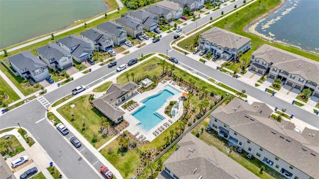 3228 Bryant Park Dr, New Port Richey, FL 34655 - aerial view of residential area featuring a pool area and a nearby body of water