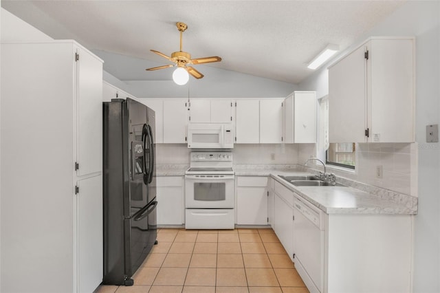 3341 S Jean Pt, Inverness, FL 34450 - kitchen featuring white appliances, a sink, vaulted ceiling, a ceiling fan, and light countertops