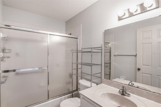 3341 S Jean Pt, Inverness, FL 34450 - bathroom with toilet, vanity, enclosed tub / shower combo, and a textured ceiling