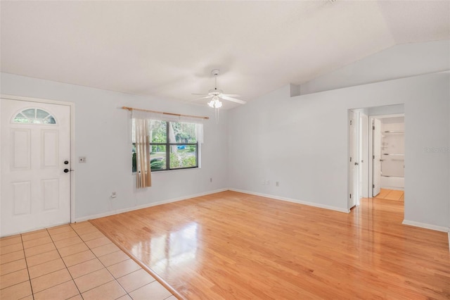 3341 S Jean Pt, Inverness, FL 34450 - foyer with lofted ceiling, a ceiling fan, light wood finished floors, and baseboards