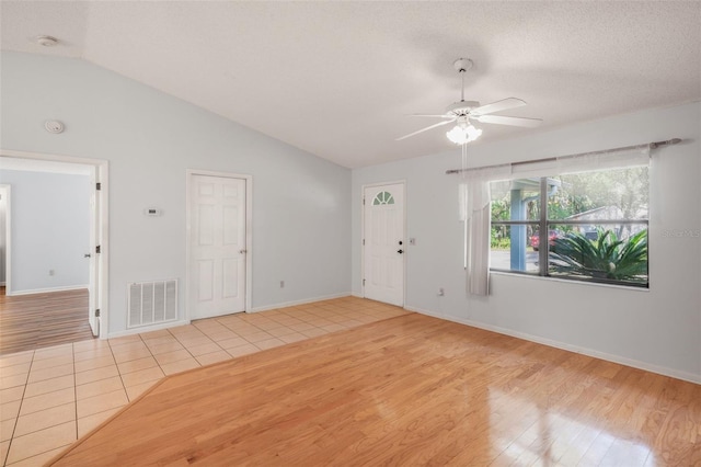 3341 S Jean Pt, Inverness, FL 34450 - spare room with wood finished floors, lofted ceiling, ceiling fan, a smoke detector, and baseboards