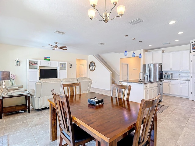 1022 Montgomery Bell Rd, Wesley Chapel, FL 33543 - dining room featuring a chandelier, ceiling fan, stairway, recessed lighting, and light tile patterned floors