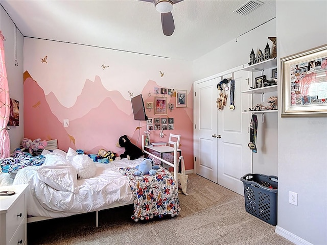 1022 Montgomery Bell Rd, Wesley Chapel, FL 33543 - bedroom featuring light carpet, a closet, and a ceiling fan
