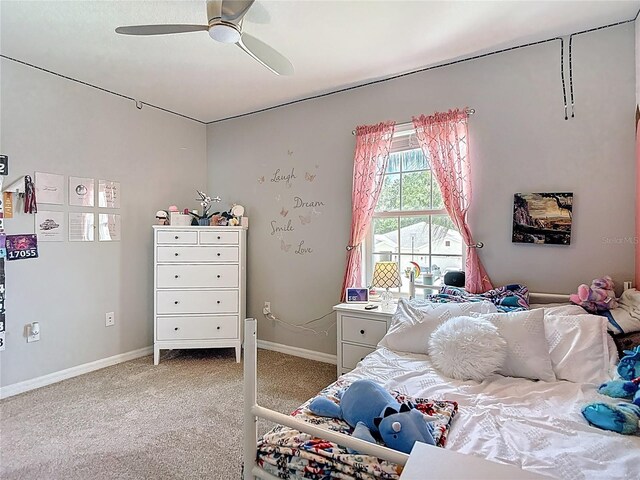 1022 Montgomery Bell Rd, Wesley Chapel, FL 33543 - bedroom with carpet flooring, baseboards, and ceiling fan
