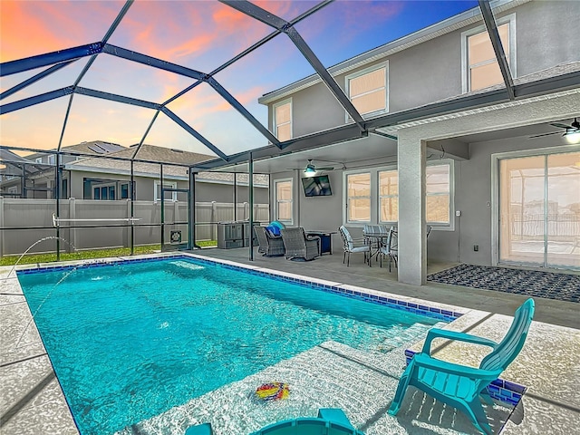 1022 Montgomery Bell Rd, Wesley Chapel, FL 33543 - view of swimming pool with ceiling fan, a patio, and glass enclosure