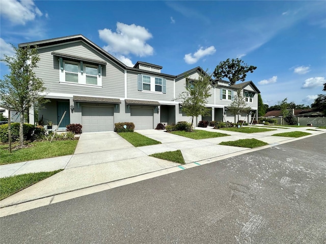 2717 Chestnut Creek Pl, Brandon, FL 33510 - multi unit property featuring driveway, a garage, and stucco siding