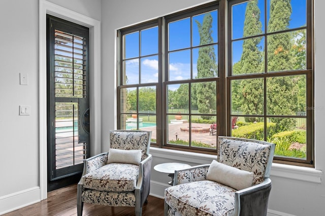 7713 Still Lakes Dr, Odessa, FL 33556 - living area with baseboards, plenty of natural light, and wood finished floors