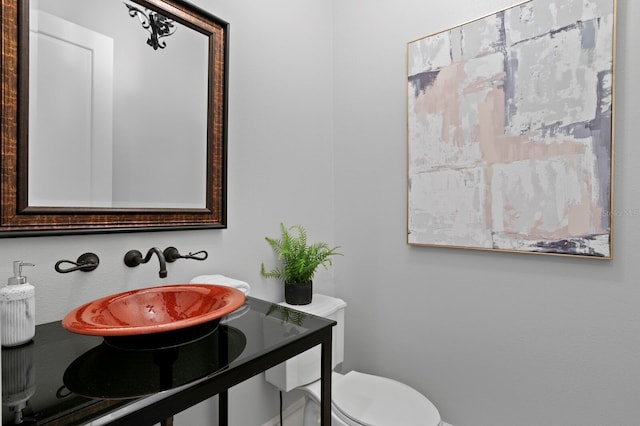 7713 Still Lakes Dr, Odessa, FL 33556 - half bath with toilet and a sink