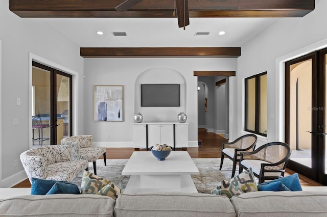 7713 Still Lakes Dr, Odessa, FL 33556 - living area featuring beam ceiling, french doors, wood finished floors, baseboards, and recessed lighting