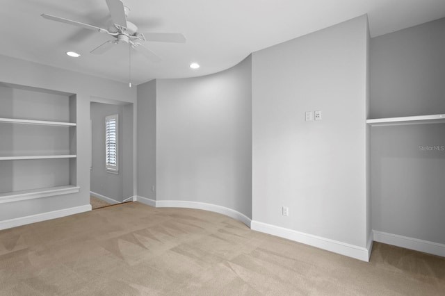 7713 Still Lakes Dr, Odessa, FL 33556 - unfurnished bedroom with light colored carpet, baseboards, recessed lighting, and ceiling fan