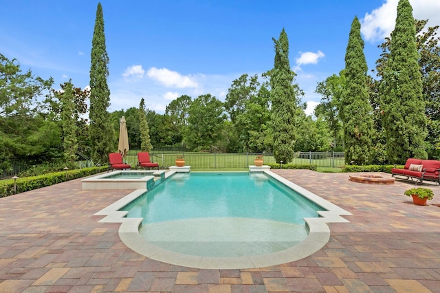 7713 Still Lakes Dr, Odessa, FL 33556 - view of pool with a patio, a fire pit, and a pool with connected hot tub