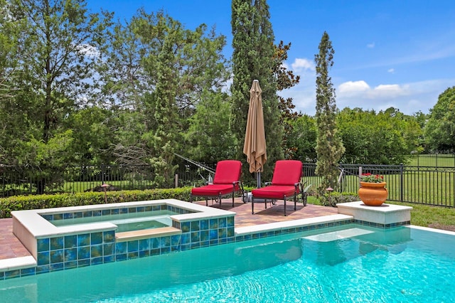 7713 Still Lakes Dr, Odessa, FL 33556 - view of pool with a patio area and a pool with connected hot tub