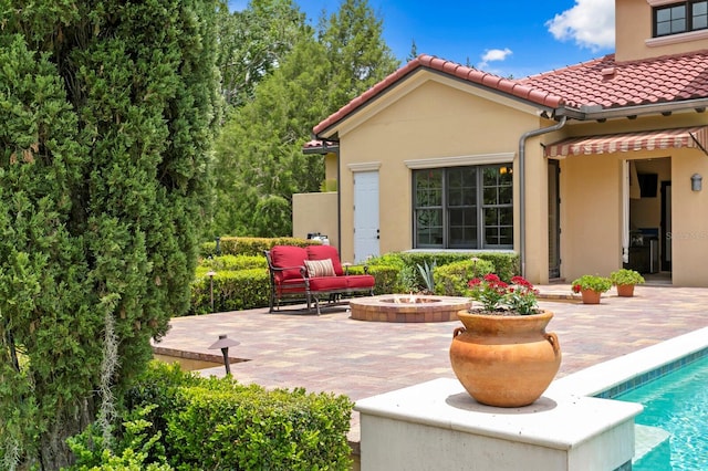 7713 Still Lakes Dr, Odessa, FL 33556 - view of patio / terrace featuring a fire pit and an outdoor pool