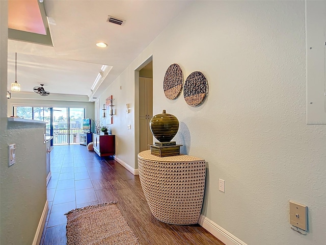 3334 Purple Martin Dr Unit 212, Punta Gorda, FL 33950 - hallway with baseboards, wood finished floors, and recessed lighting