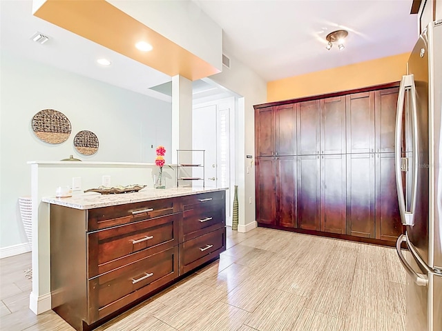 3334 Purple Martin Dr Unit 212, Punta Gorda, FL 33950 - bar area featuring freestanding refrigerator, baseboards, and recessed lighting