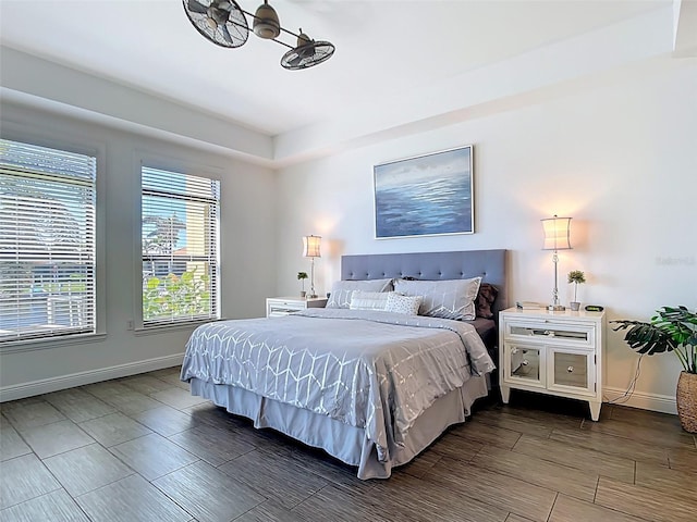 3334 Purple Martin Dr Unit 212, Punta Gorda, FL 33950 - bedroom featuring baseboards and wood finished floors